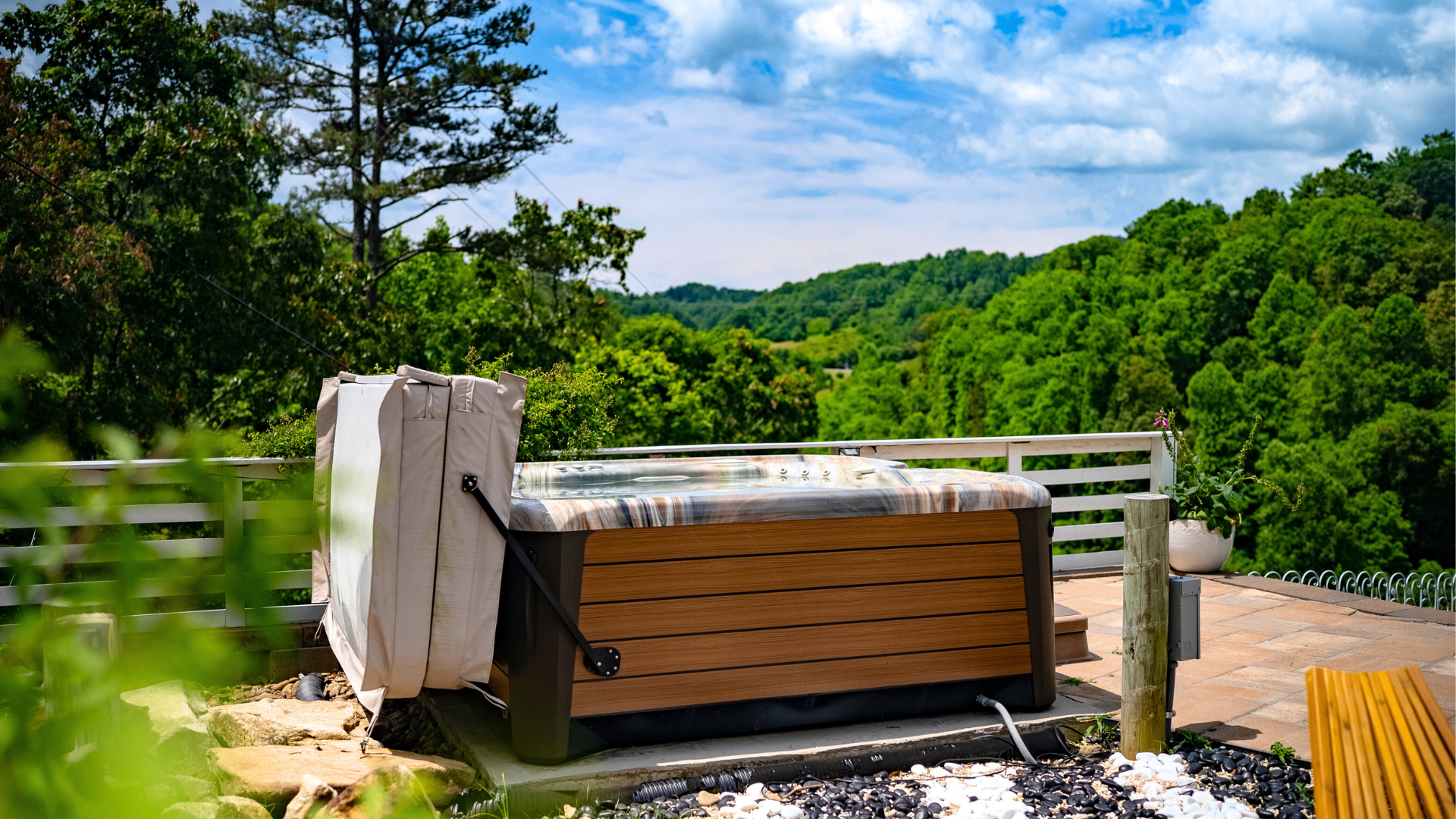 Hot tub on the deck overlooking the valley