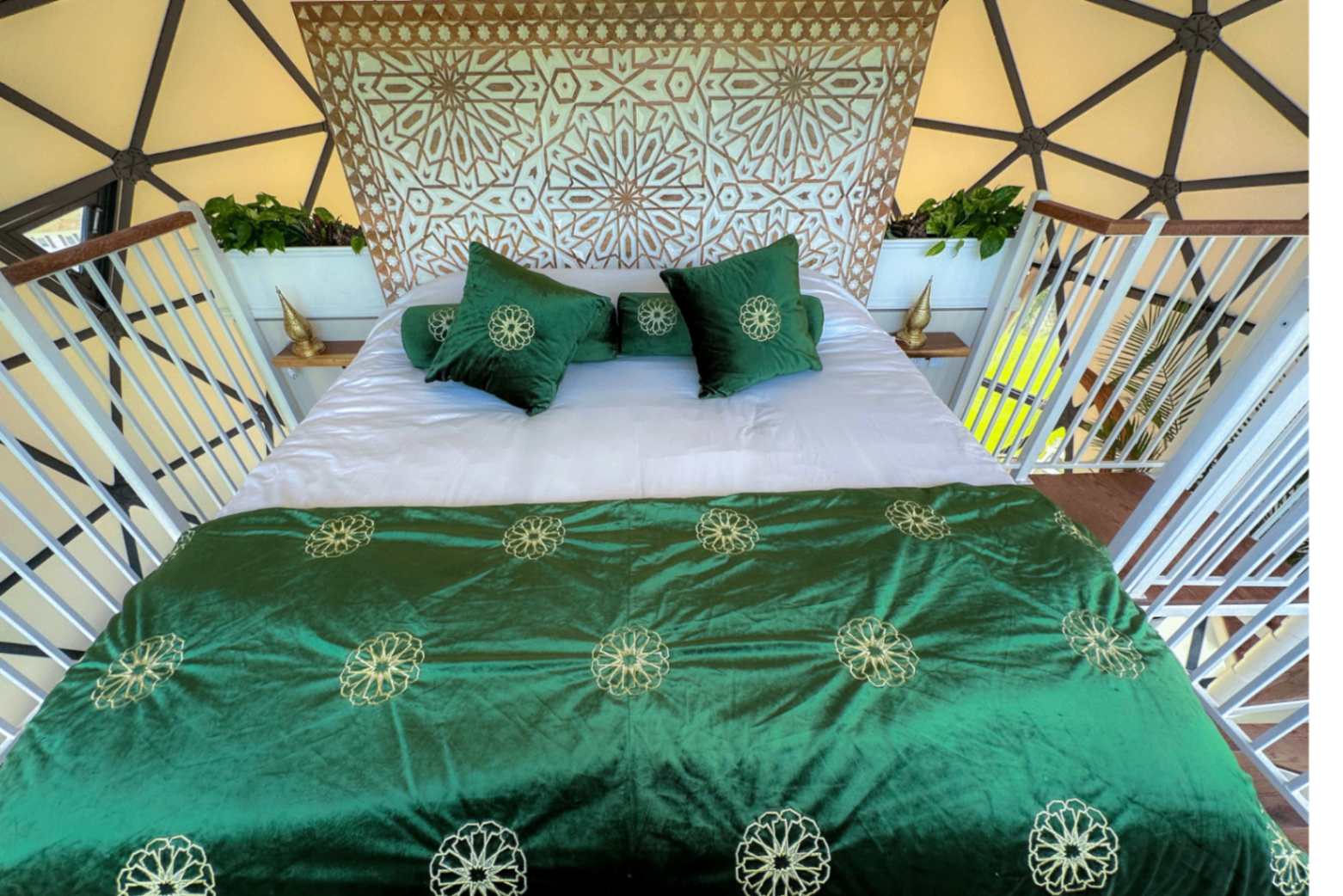 Casablanca dome — king bed with hand-carved Moroccan headboard and emerald velvet