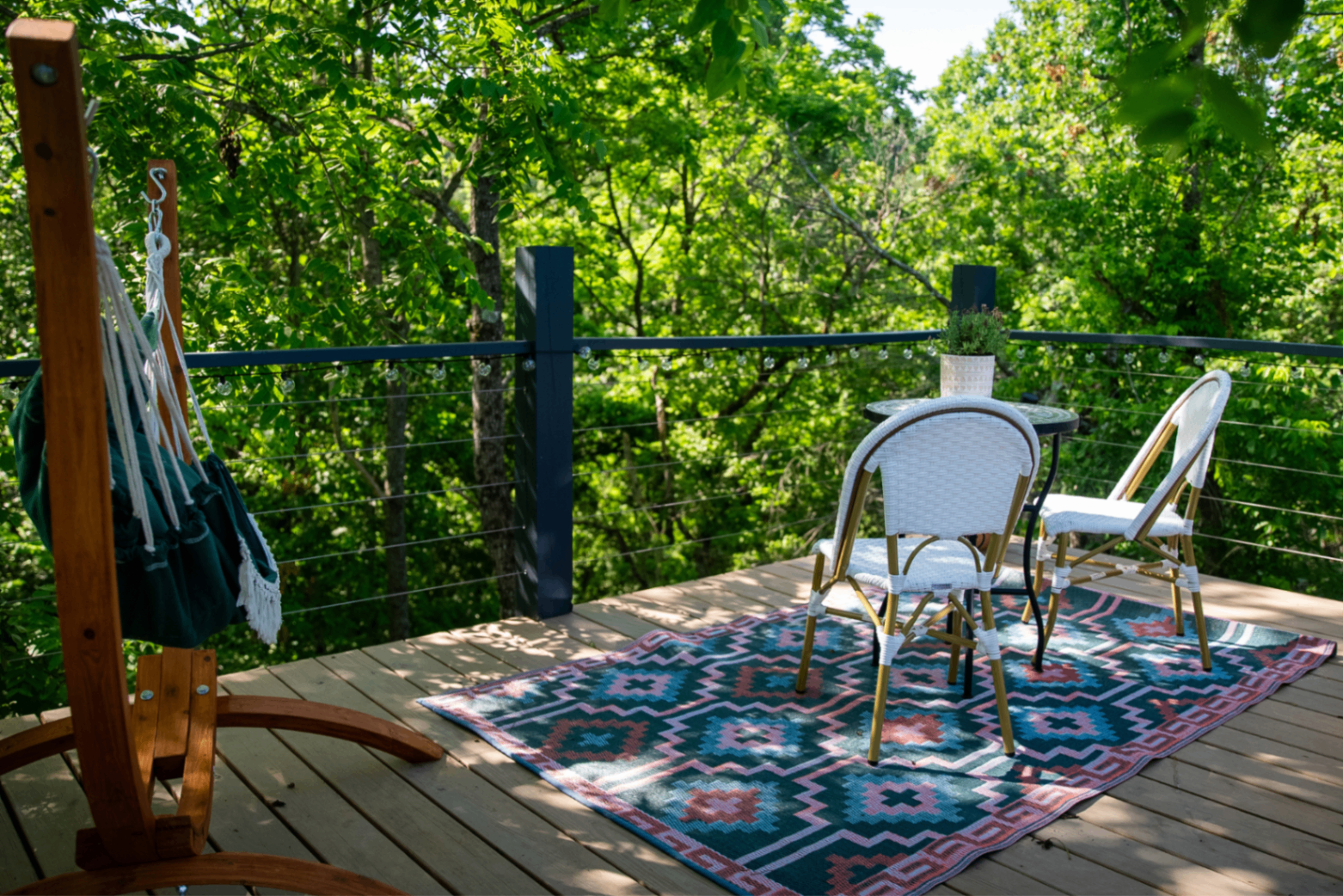 The private deck outside the Fes Dome with a bistro table