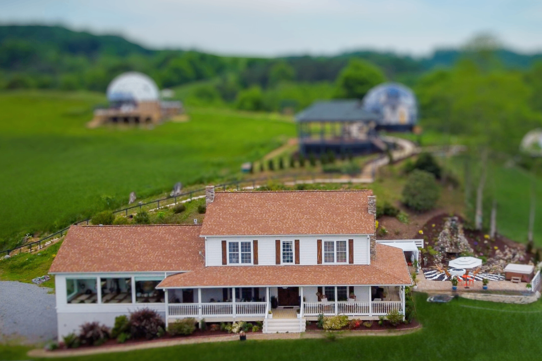 Aerial view of the Maison, domes, and Blue Ridge beyond