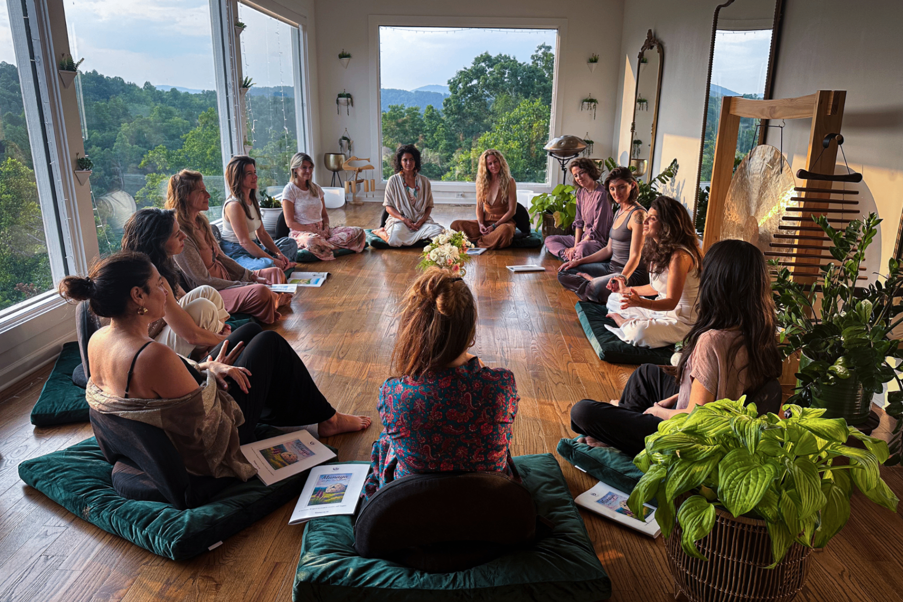 A circle gathered inside the Glass Studio